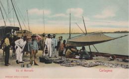 76   -  <p><span class="description">En el Mercado Cartagena ca 1900s</span></p>